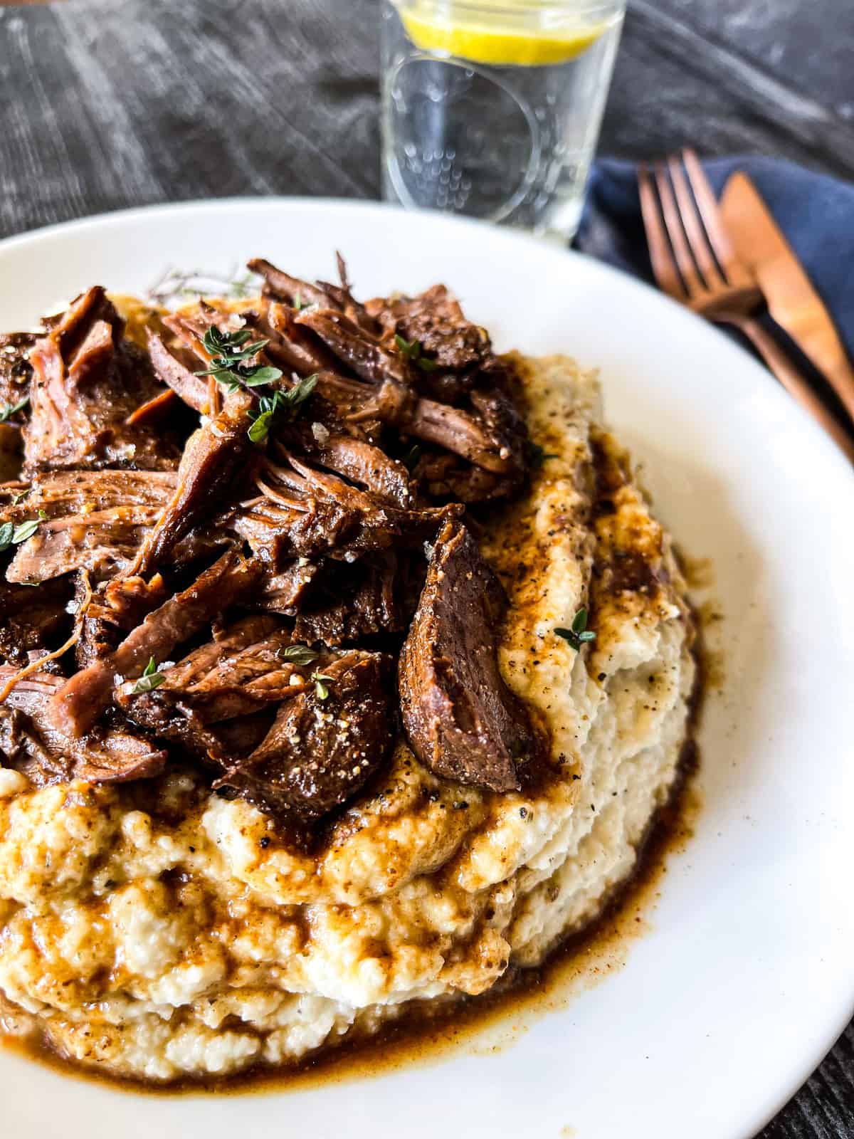 beef pot roast served over mashed potatoes