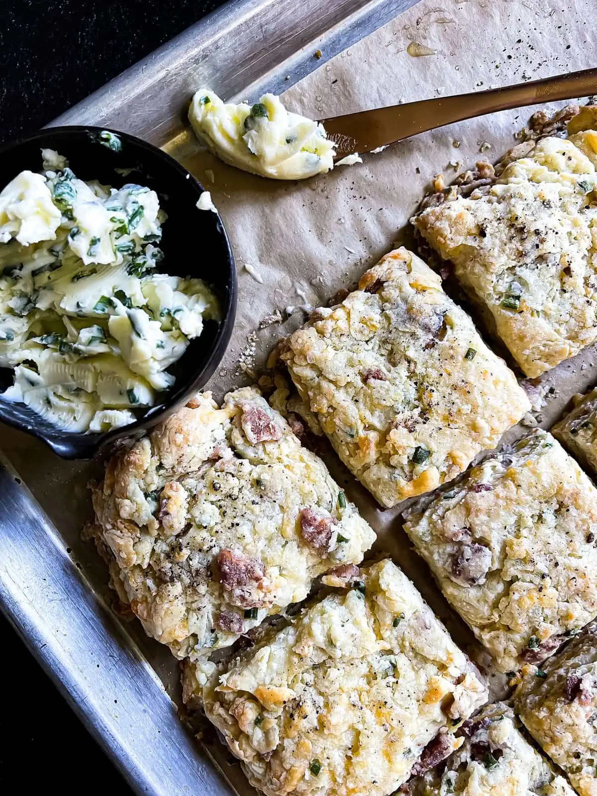 Homemade sour cream biscuits with chive butter