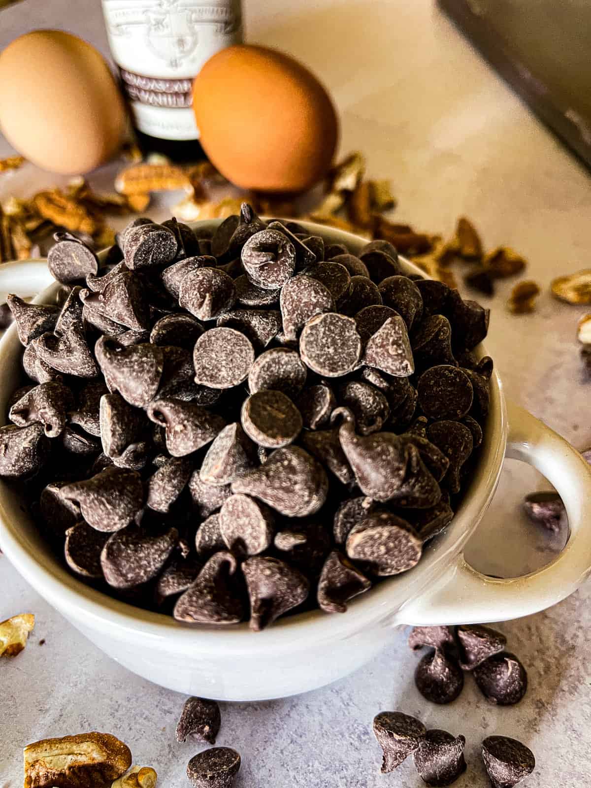 bowl of chocolate chips for brown butter chocolate chip cookies