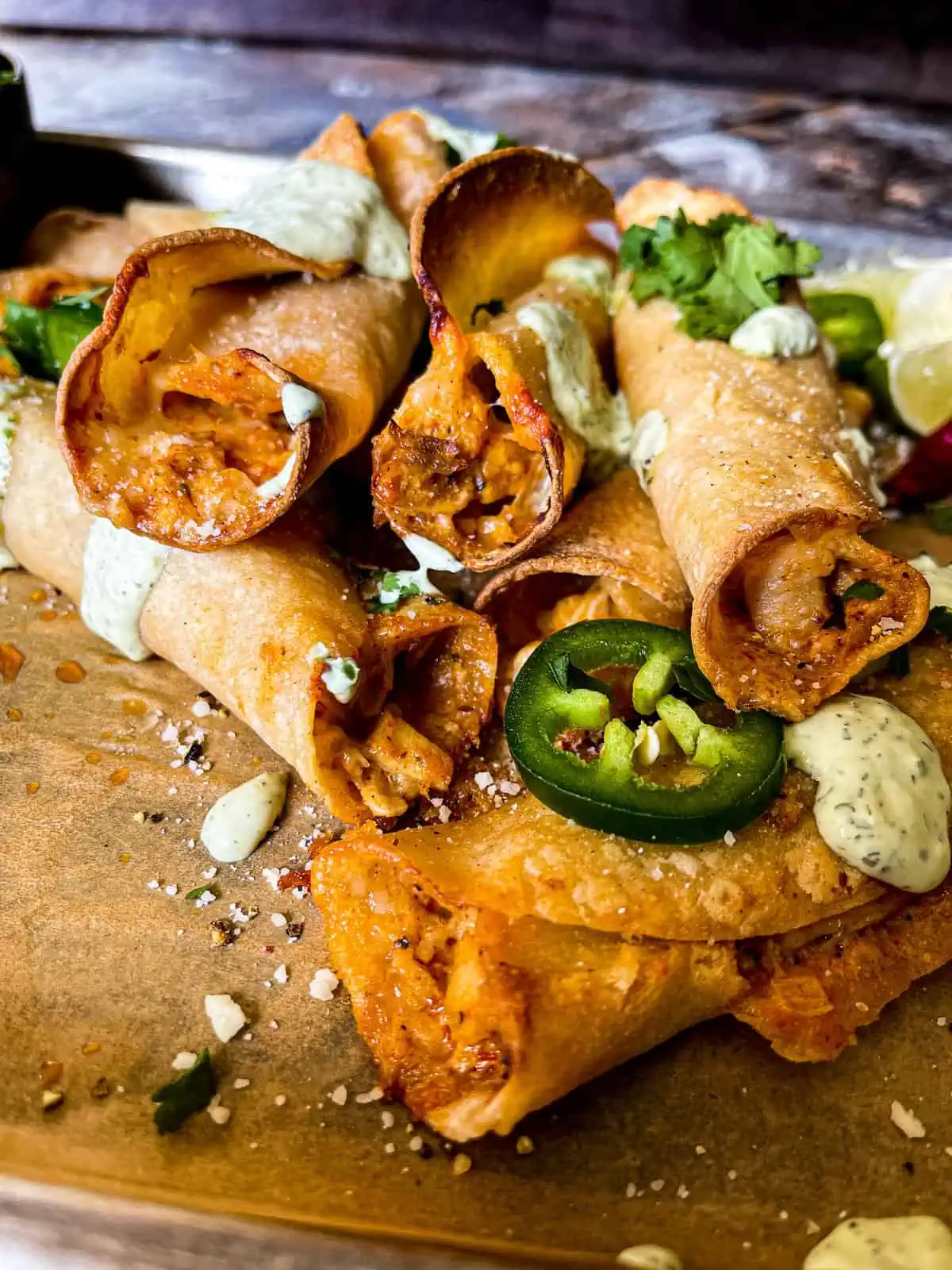 closeup of taquito mixture and garnishes