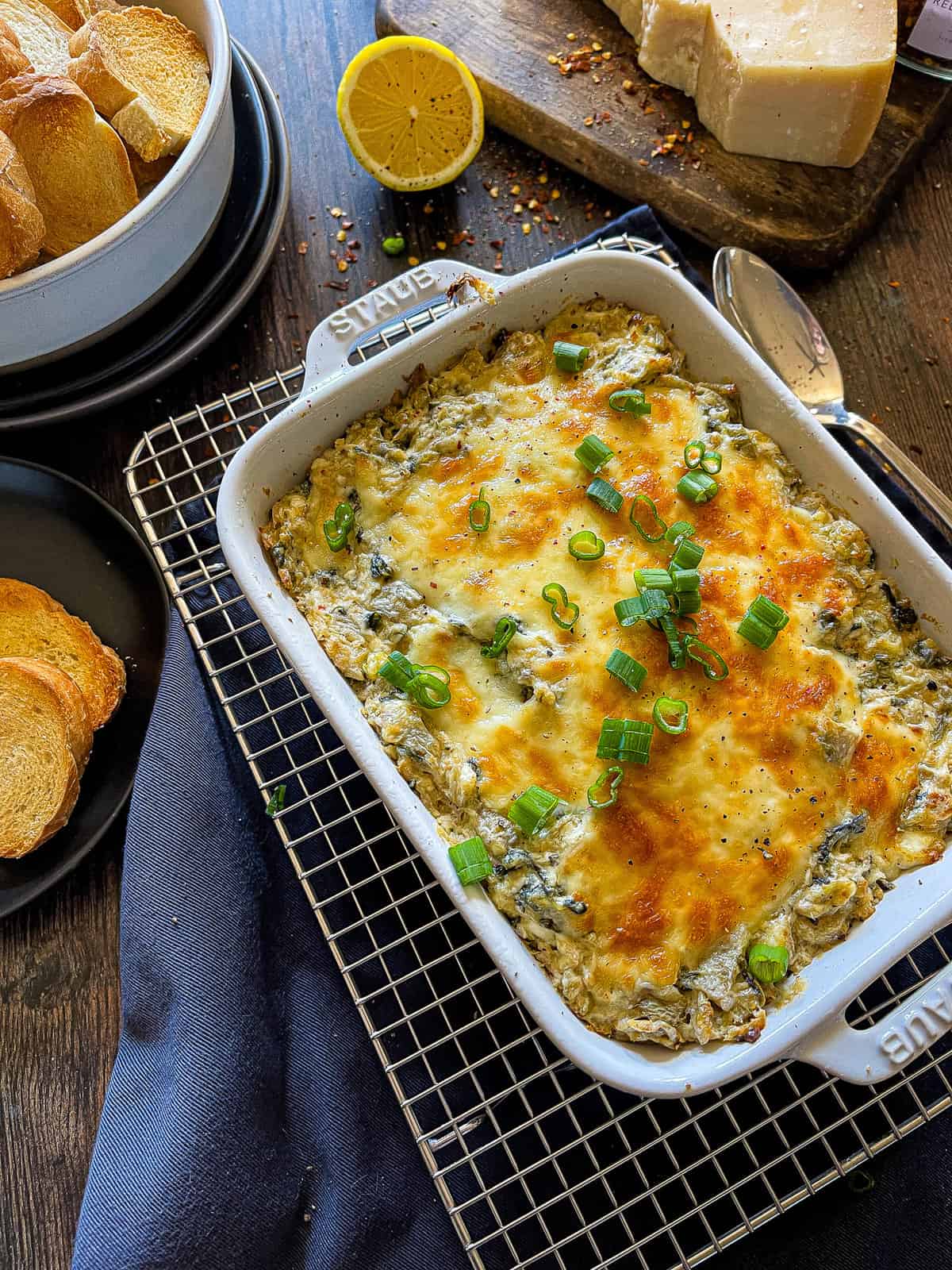 spinach artichoke dip in a baking dish