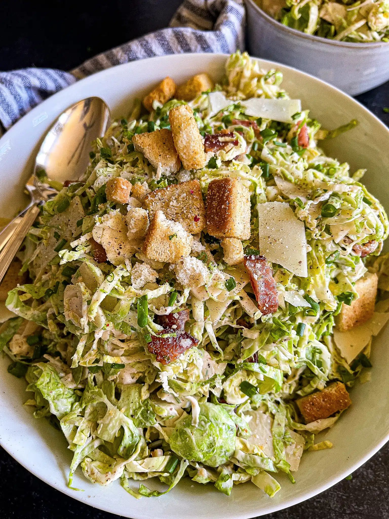 brussels sprouts salad in a serving bowl