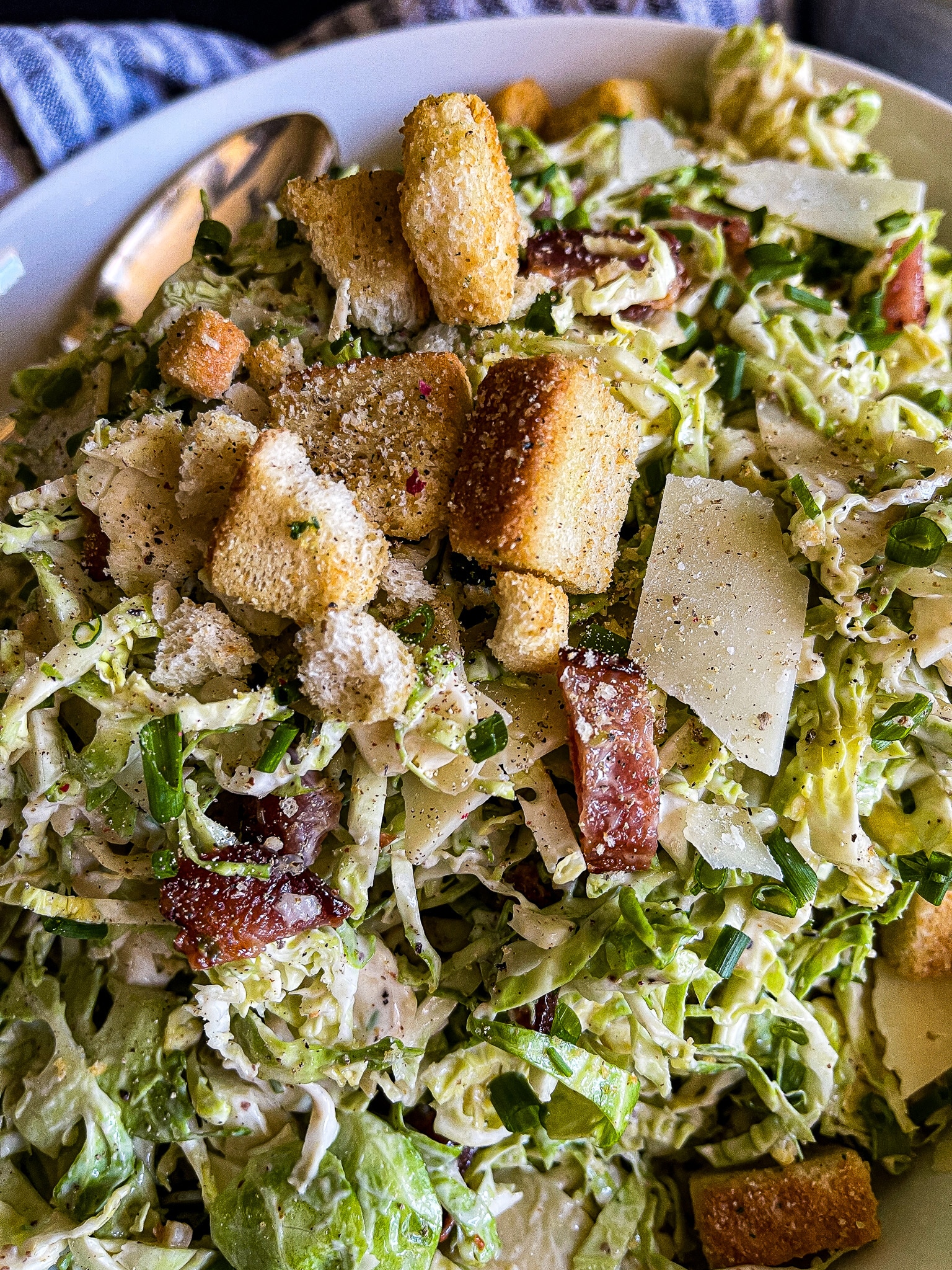 brussels sprouts salad with bacon, parmesan, and croutons