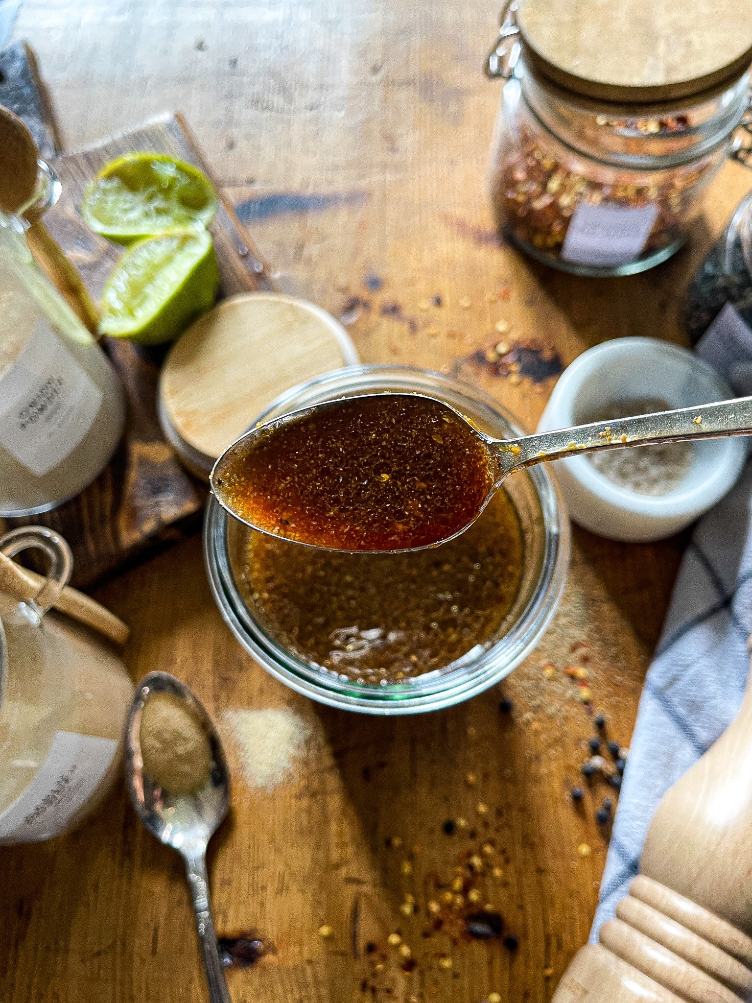 grill marinade in a glass jar surrounded by recipe ingredients