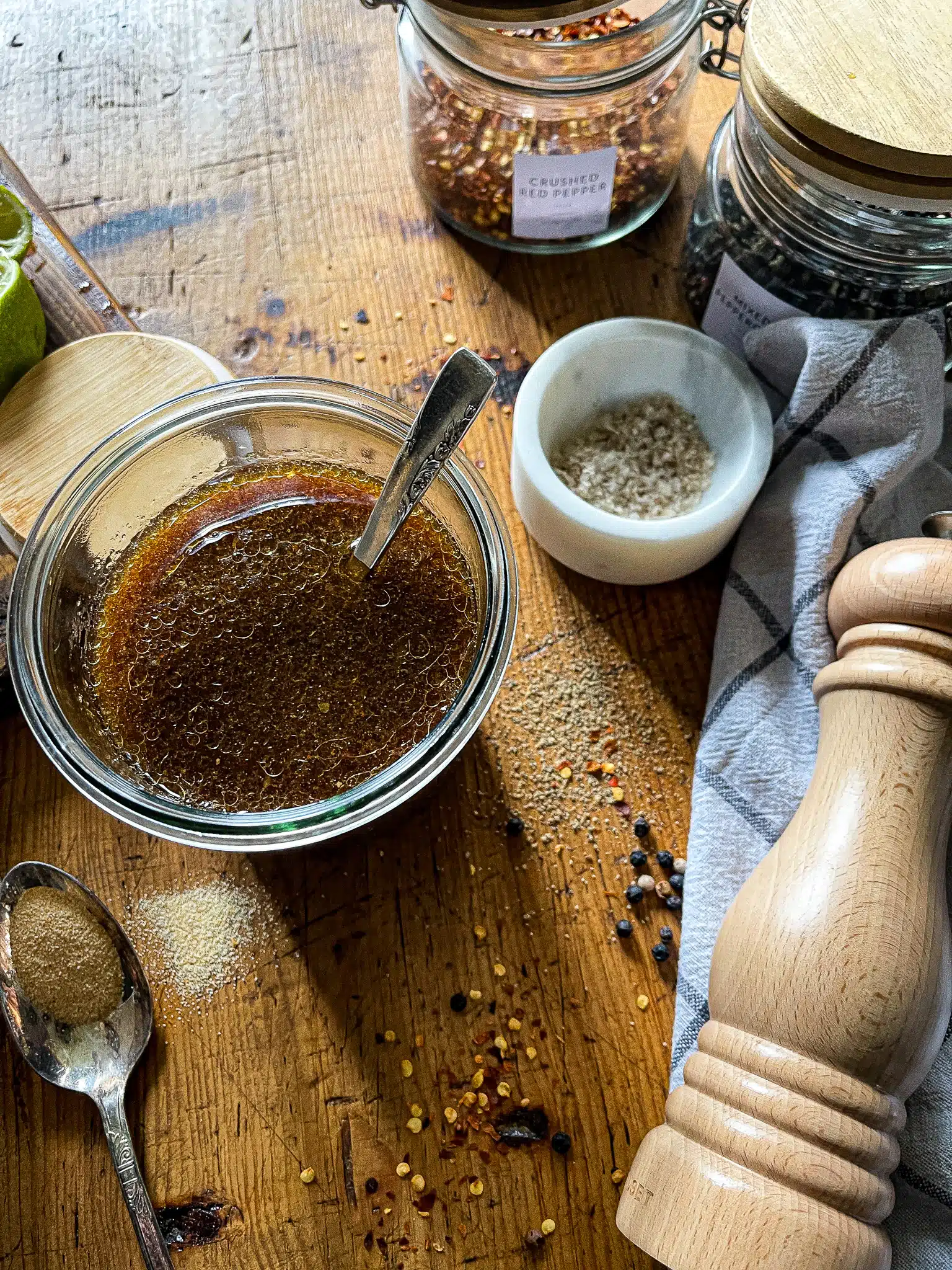 grill marinade in a glass jar surrounded by ingredients