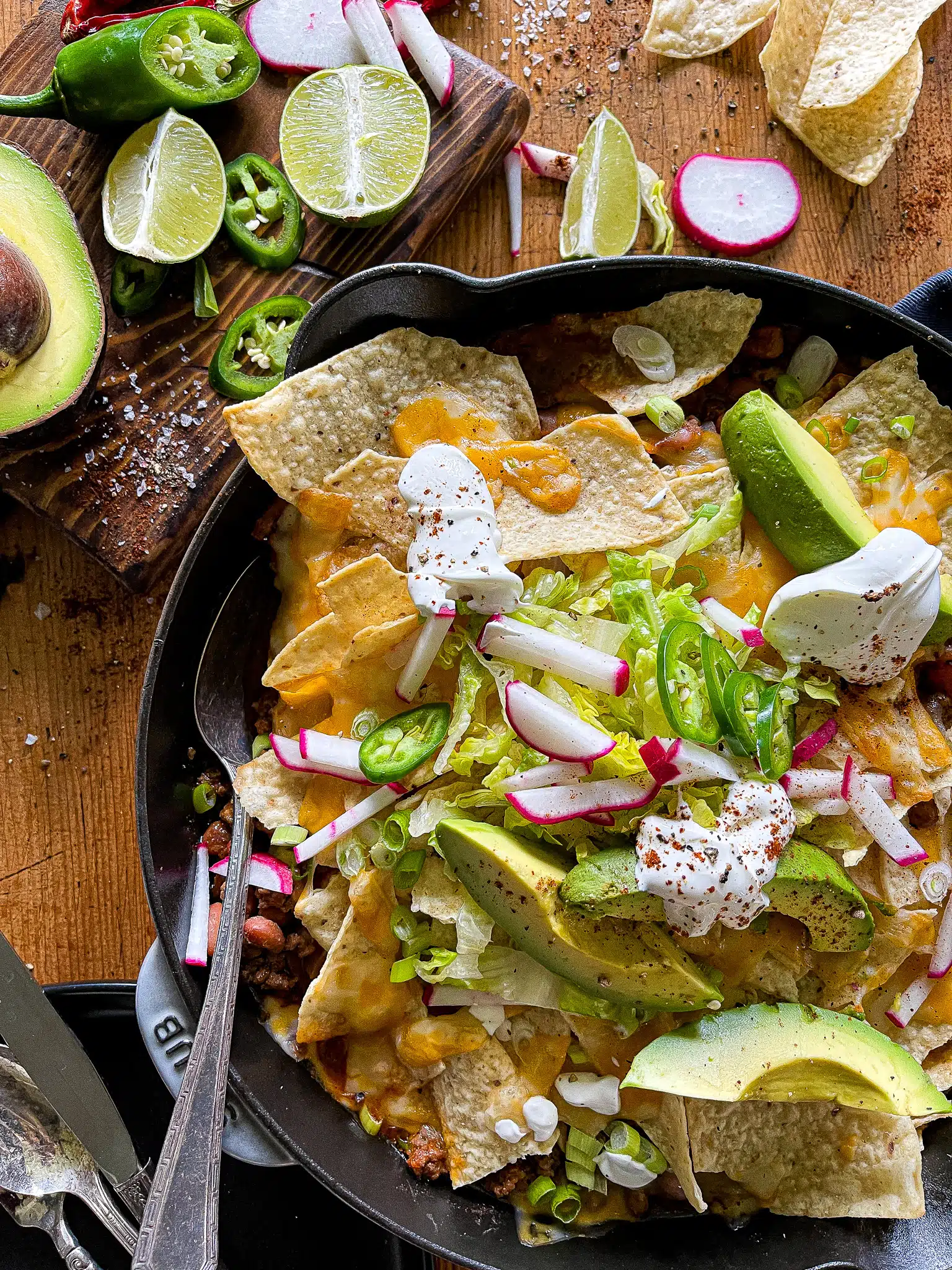 skillet taco bake recipe with garnishes