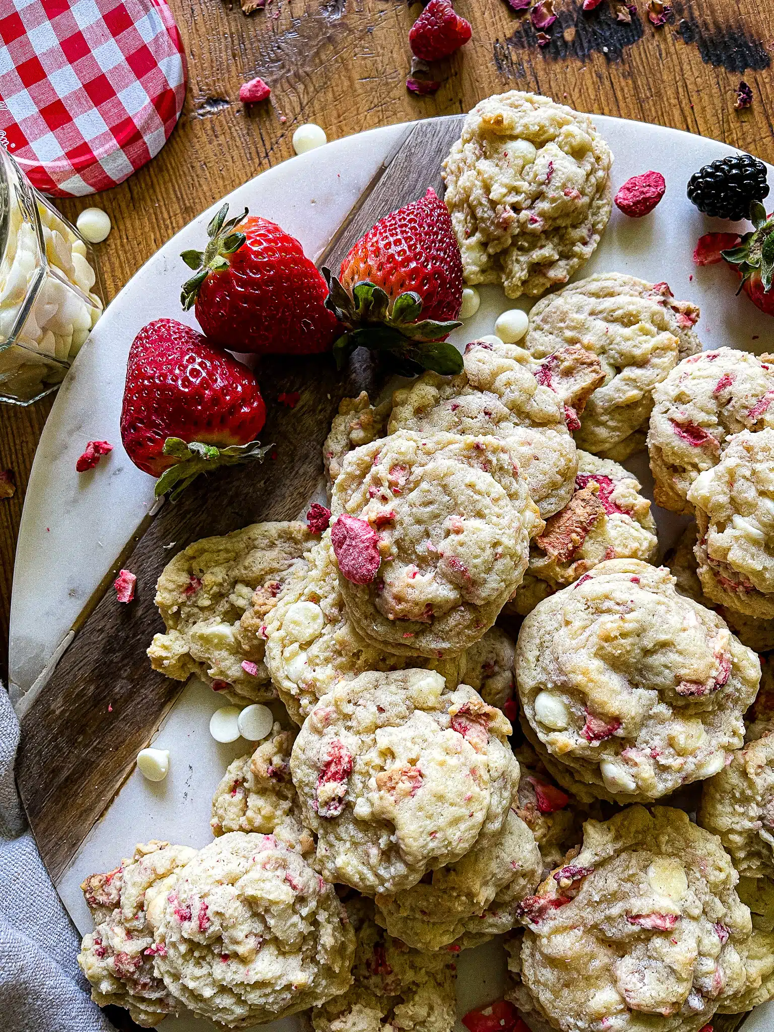 strawberries and cream cookies served with a side of fresh berries