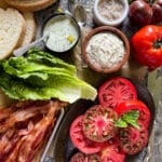 This is a picture BLT sandwich ingredients laid out onto a large serving platter.