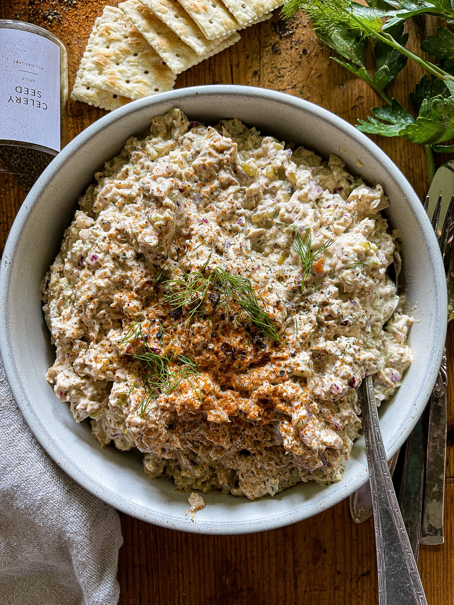 chicken salad in a bowl with serving spoon