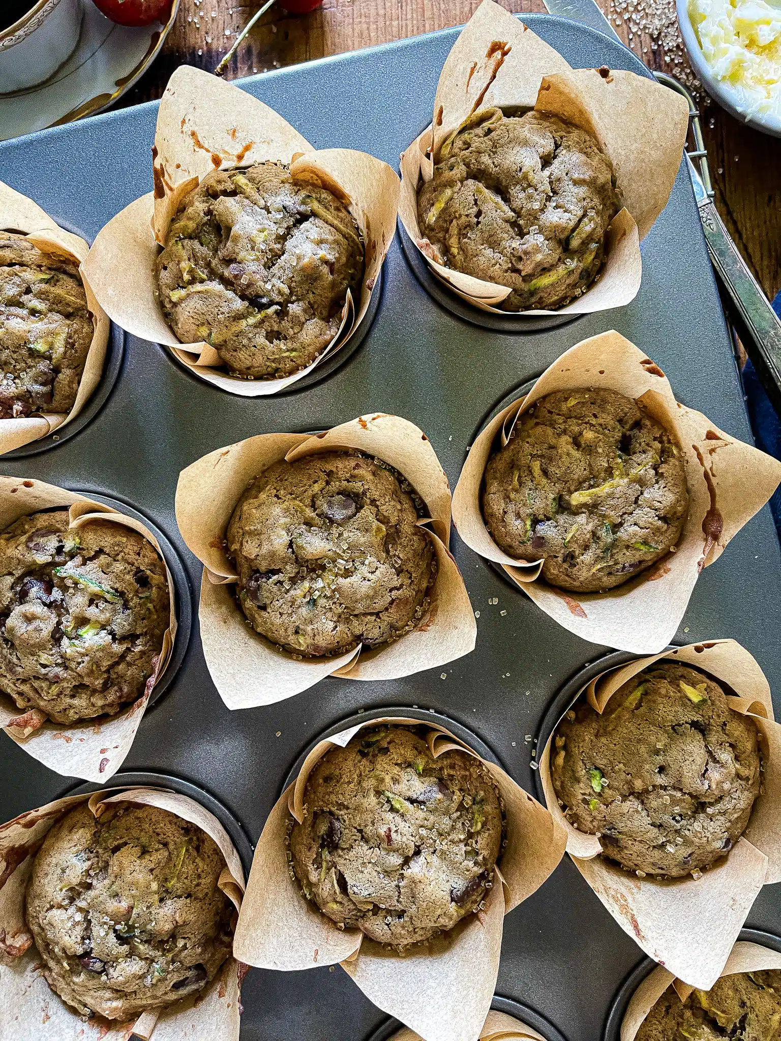 zucchini bread muffins in muffin tin