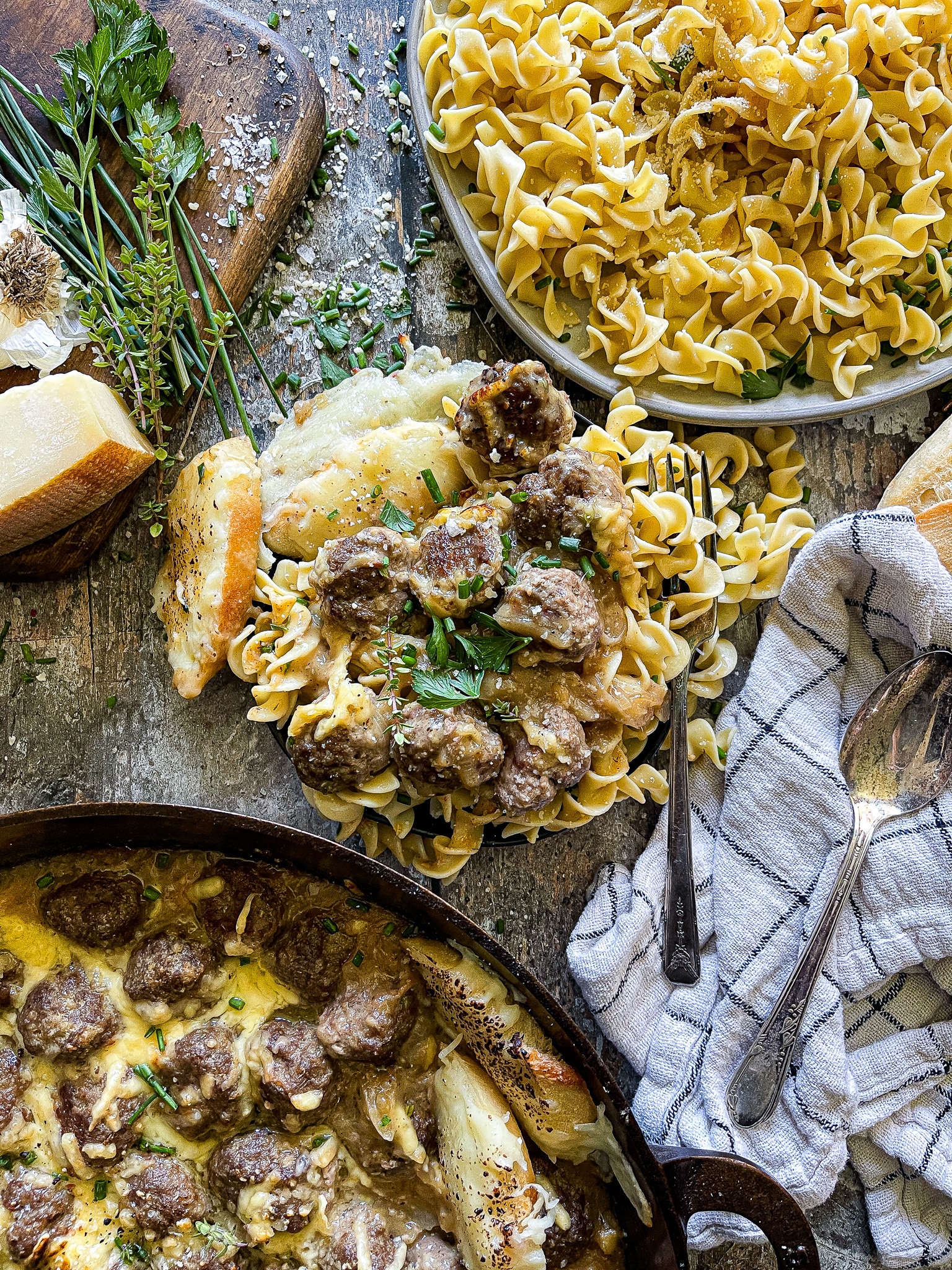 French onion meatballs served over a bed of butter egg noodles