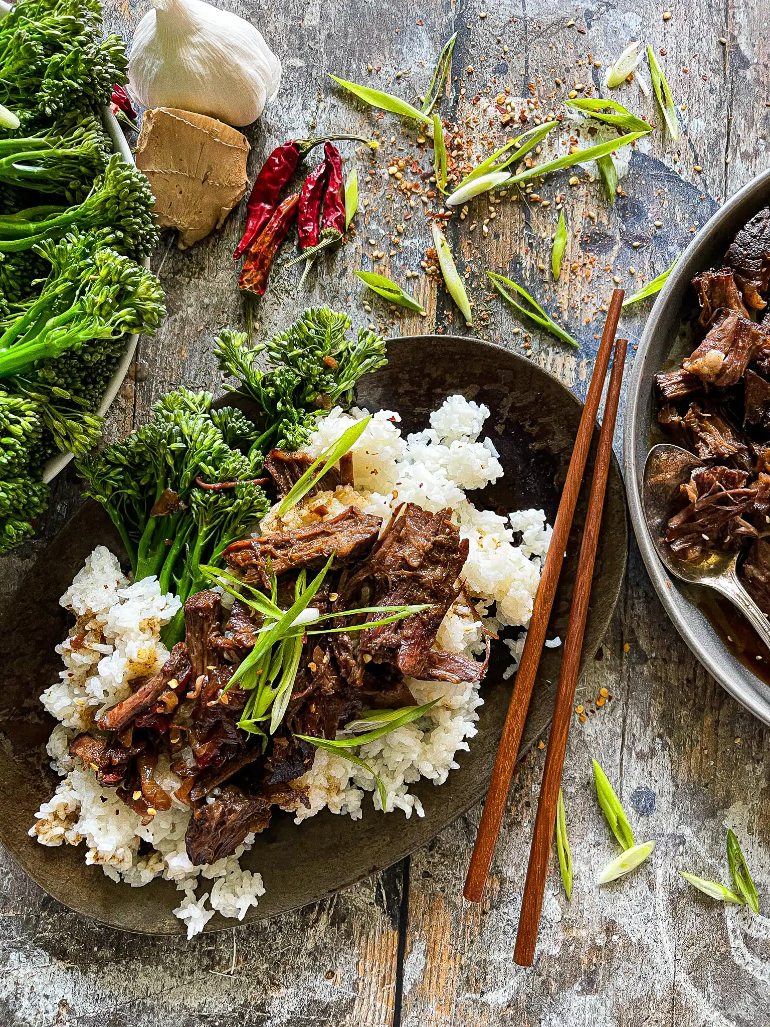 mongolian beef plated with side of broccoli