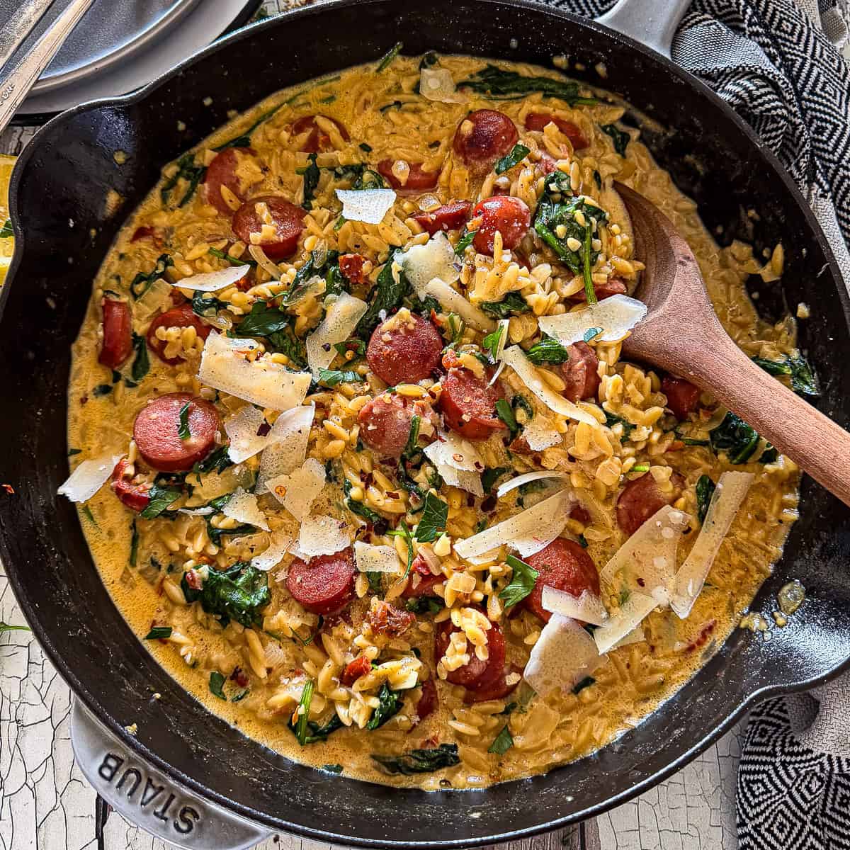 Creamy Italian sausage and orzo with spinach
