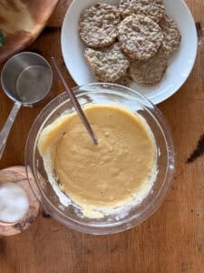 pancake batter in a glass mixing bowl