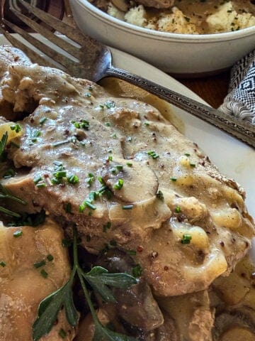 slow cooker smothered pork chops featured image