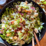 bacon ranch pasta salad in a black serving bowl