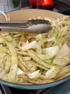 cabbage cooking in a large skillet